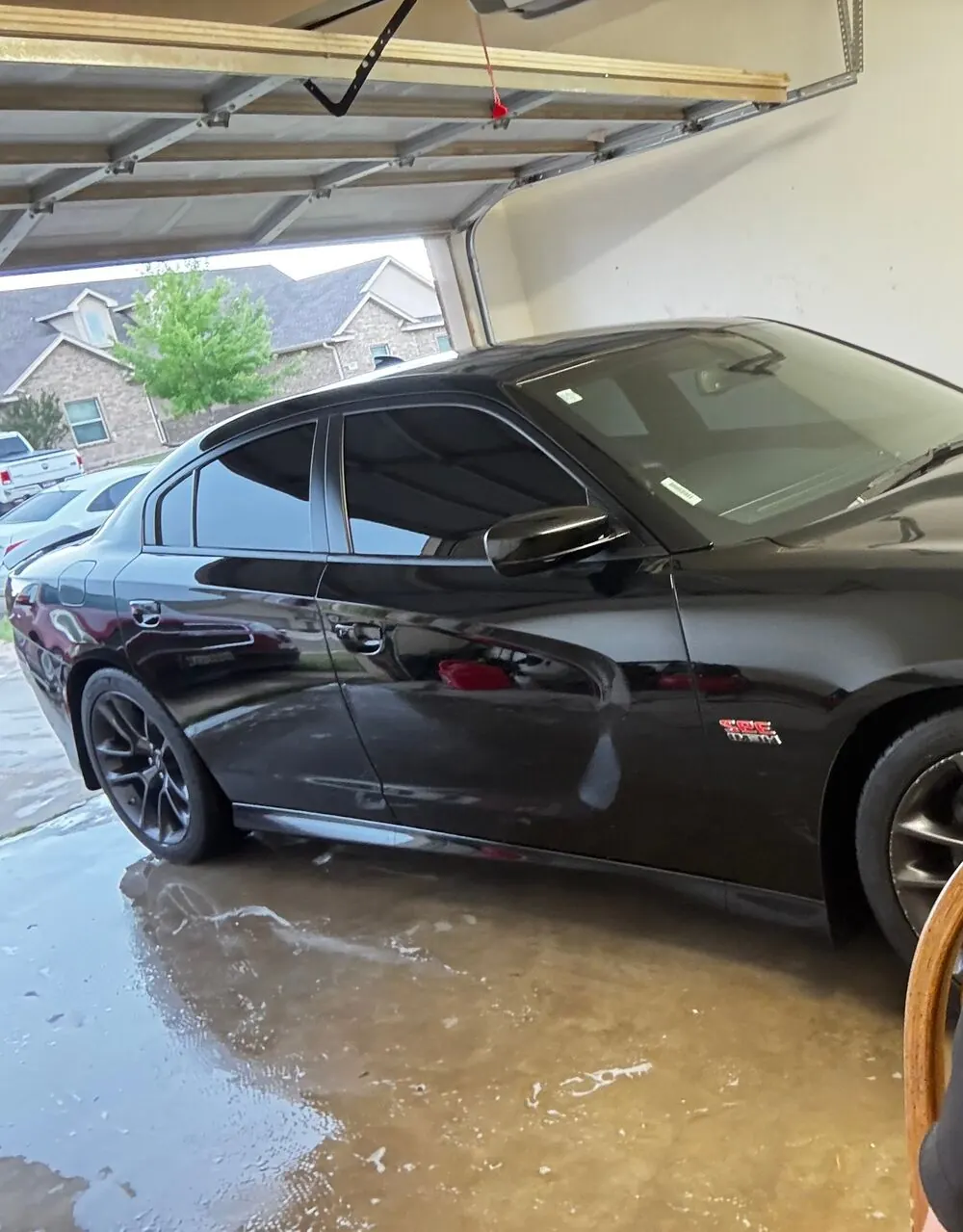 Black Dodge Charger with a fresh shine