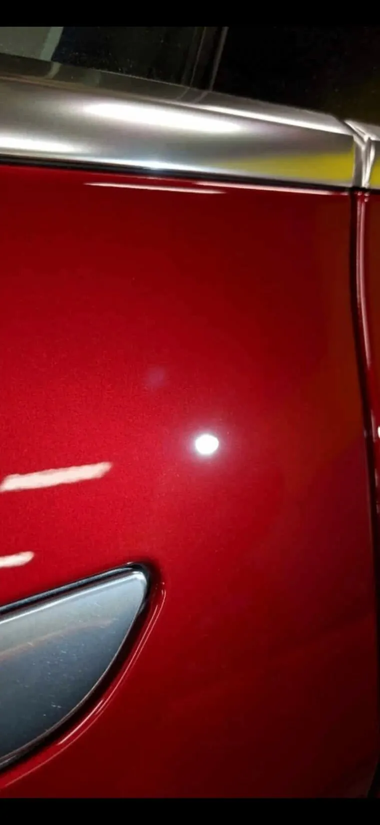 Glossy red door after correction and coating